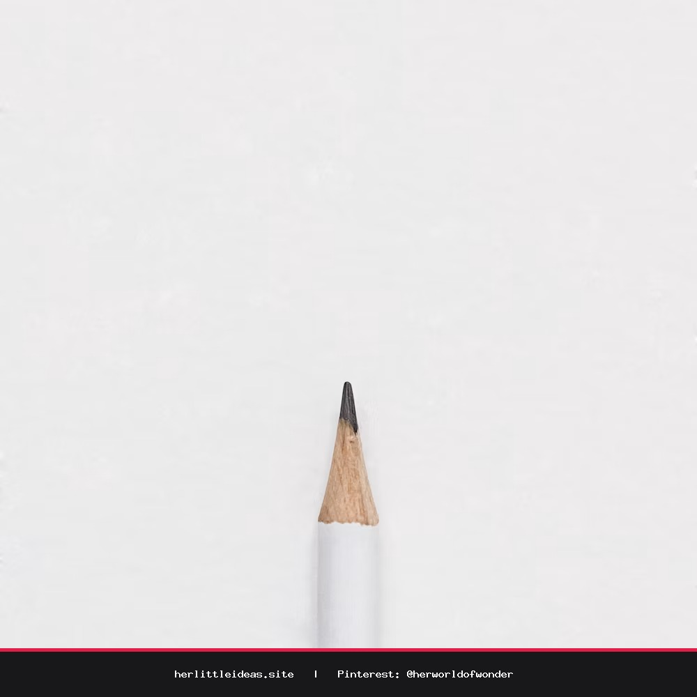 Close up of hands arranging a dried flower on a clear bookmark sheet.